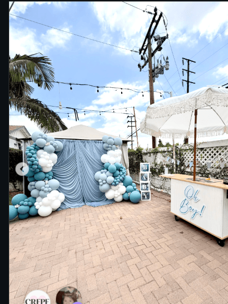 Baby shower crepe cart with balloon backdrop