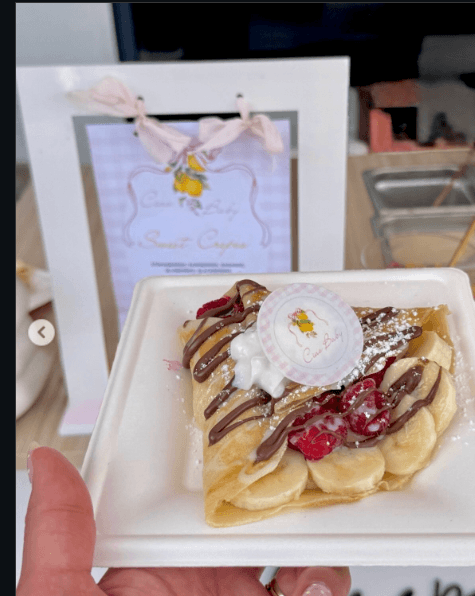 Handheld strawberry banana crepe made to order
